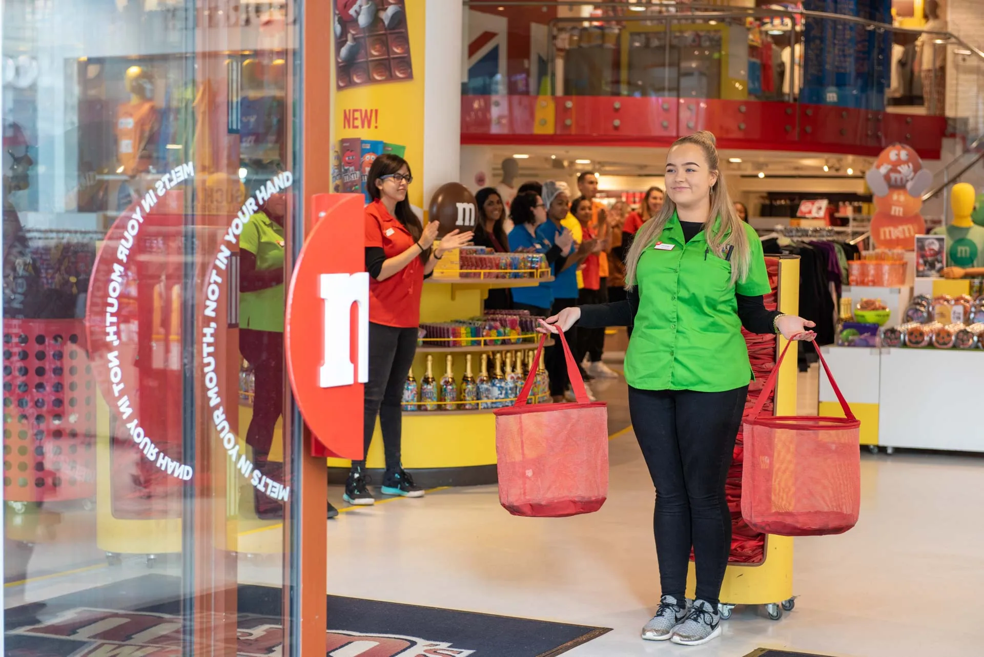 Event photography at M&M World London chocolate wall — commercial photography by Thinksay